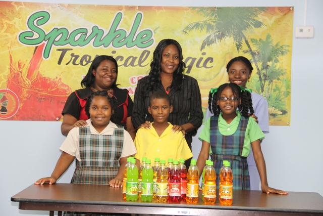 (l-r) Kaylan William and teacher Renee Anthony of the Charlestown Primary School, second place winner Tershean Wilkinson and teacher Trish Griffin of the St. Thomas Primary School, Destiny Lowe and teacher Cleanda Roberts of the Joycelyn Liburd Primary School at a brief ceremony hosted on May 29, 2014 at the TDC conference room located at Pinney’s Industrial Estate